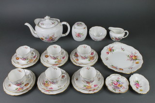 A Crown Derby, Derby Posies tea set comprising teapot, cream jug, sugar bowl, 6 tea cups, 6 saucers, 6 small plates, a sandwich plate, 2 dishes and a lidded jar 