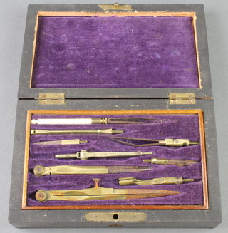 A 19th Century brass and steel 8 piece geometry set contained in a rosewood case with hinged lid 