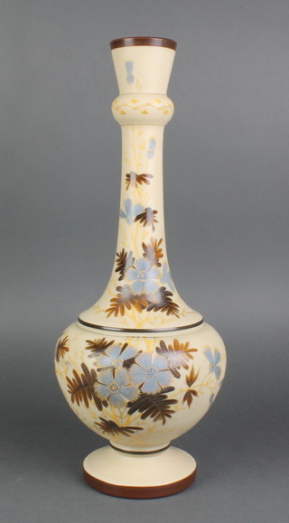 A Victorian painted glass vase decorated with flowers and leaves 8 1/2" 