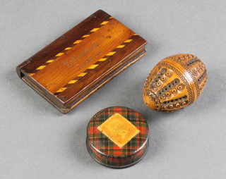 A Victorian Killarney inlaid yew paperweight in the form of a book marked Killarney Lakes 3" x 2", a Victorian circular McPherson tartan jar and cover 1 1/2" and a Victorian carved and pierced walnut in the form of an egg 2" 