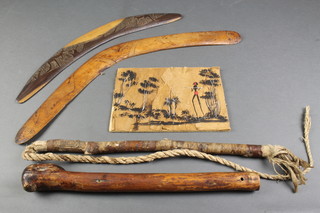 2 Australian boomerangs 18", an Aboriginal drawing of a warrior in a wooded area 6" x 8", a whip and a small club 