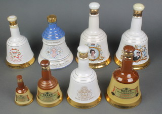 8 ceramic Wade decanters containing  approx. 380cl of Bells Whisky to commemorate the Queen's 60th Birthday, the wedding of Prince Andrew and Sarah Ferguson, the Queen Mother's 90th Birthday, Prince William of Wales Birthday,  Prince Henry of Wales Birthday and 3 graduated decanters 