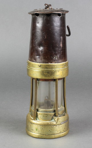A 19th Century brass and steel miner's safety lamp marked 851