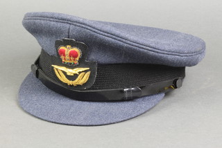 An Elizabeth II Royal Air Force officer's peaked cap, size 59
