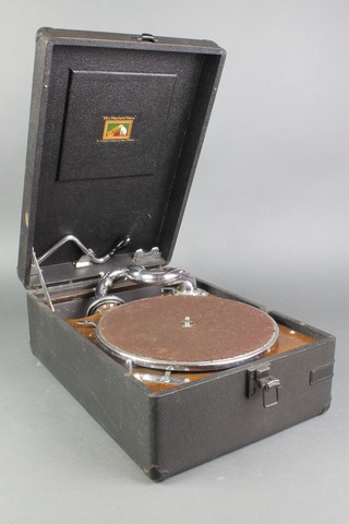 A His Master's Voice model 102 portable manual gramophone contained in a black fibre case 