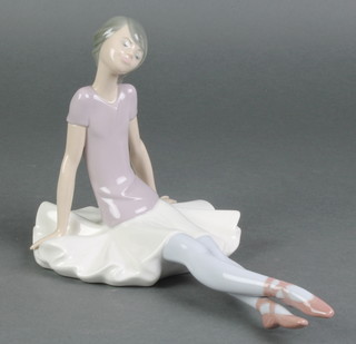A Lladro figure of a seated ballerina 1356 10" 