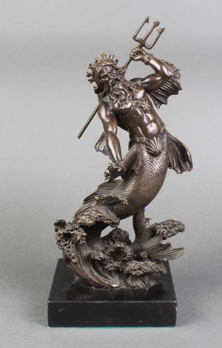 A bronze figure of a standing Neptune, raised on a rectangular marble base (base chipped) 13" 