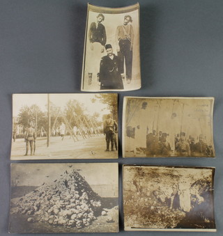 5 First World War period black and white photographs  - 2 x  Armenians hung at Constantinople 3 1/2" x 5 1/2", skull and bones arrangement at Constantinople 3 1/2" x 4" and 1 other 3 1/2 x 5 1/2"  