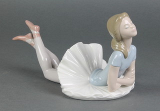 A Lladro figure of a reclining ballerina 10" 