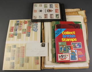 A Victorian envelope with franked penny black, 5 stamps albums of used stamps including United States, Borneo, New Zealand etc, a Victorian postage stamp album of used world stamps and loose sheets of used Canadian stamps