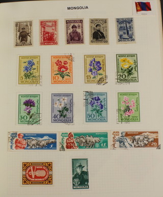 An album of stamps including Mongolia, Montenegro, Morocco, Mozambique, Mocambique
