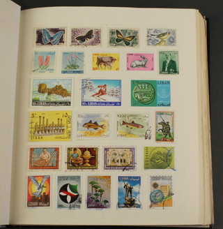 An album of mint and used World stamps including Lagos, Latvia, Lebanon, Libya, Lithuania, Madagascar 