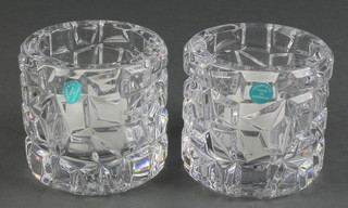 A pair of Tiffany glass candle holders of rustic form 3 1/2", boxed 