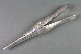A pair of novelty silver glove stretchers/letter clip in the form of a ducks head, 7" 