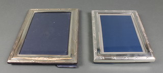 2 modern silver photograph frames 9" x 7" and 10" x 8", 1991