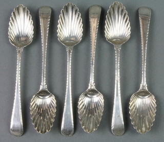 A set of 6 Georgian silver teaspoons with shell backs and bright cut decoration 