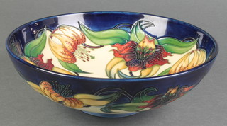 A late 20th Century Moorcroft fruit bowl decorated with stylised flowers with printed marks 10" 