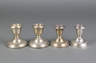 2 pairs of dwarf silver candlesticks 2 1/2" Birmingham 1926 and 2 1/2" Birmingham 1974 