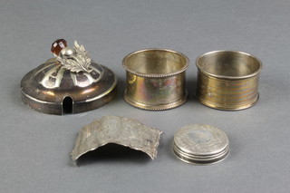2 silver napkin rings, a toilet jar lid and walking stick collar together with a plated lid, 48 grams