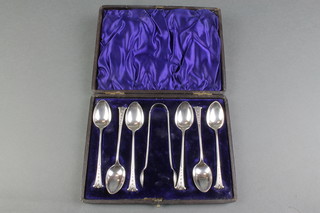 A set of Victorian silver teaspoons and nips with fancy ends, Sheffield 1894, 98 grams 