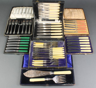 A cased pair of silver plated fish servers, 6 cased plated sets 