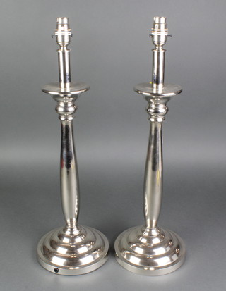 A pair of  plated oviform table lamps with round bases 22" 