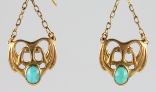 A pair of Art Nouveau style yellow gold turquoise set drop earrings 