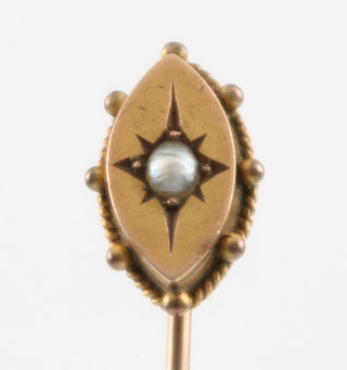 An Edwardian pearl set tie pin
