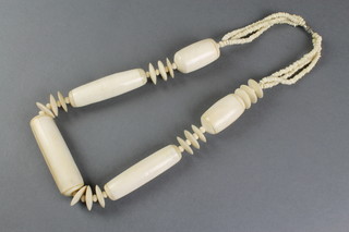A bone and ivory elongated bead necklace 26" 