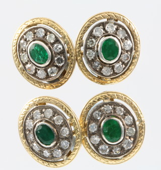 A pair of yellow gold emerald and diamond oval double sided cufflinks, the oval emerald surrounded by brilliant cut diamonds 