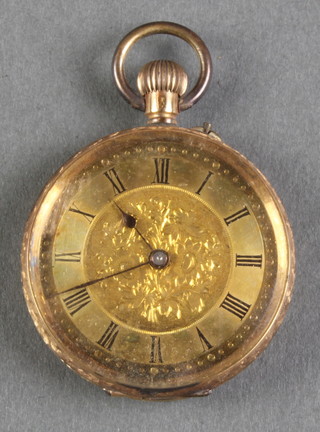 A lady's Edwardian 14ct gold watch with champagne dial 