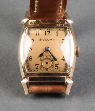 A gentleman's 1930's Bulova 14k gold plated cased tonneau wristwatch with seconds at 6 oclock on a leather strap with fitted box and outer box with original guarantee 