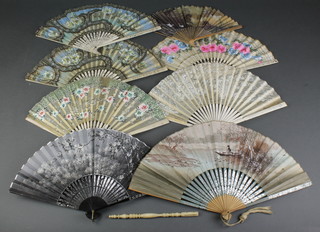 An early 20th Century Japanese fan painted floral decoration 9", 7 other fans and a fan handle 