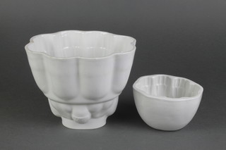 A Victorian white glazed high jelly mould 6 1/2", a smaller ditto 3" 