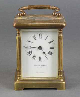 Mappin & Webb, a French carriage clock with enamelled dial and Roman numerals contained in a gilt metal case