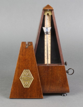 Maelzel, a French metronome contained in a walnut case 