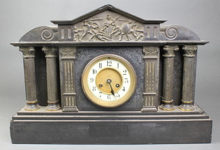 A Victorian French 8 day striking mantel clock with porcelain dial and Arabic numerals contained in a black marble architectural case with Roman battle scene supported by columns 