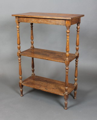 A Victorian rectangular oak 3 tier what-not, raised on turned and block supports 36"h x 25"w x 13"d 