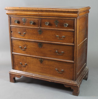 A 17th/18th Century Continental oak chest  with 3 plank top, fitted a secret drawer above 2 short drawers above 3 long drawers, raised on bracket feet 45"h x 42"w x 24"d 