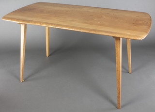 Ercol, a light elm rectangular dining table, raised on out swept supports together with 2 extensions 29"h x 53"l x 28"w, with the 2 extensions added and in place the length of the table is 90",  labelled supplied by John Peering 