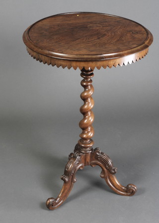 A Victorian circular rosewood occasional table, raised on spiral turned and carved column base on scroll feet 29"h x 20"diam. 