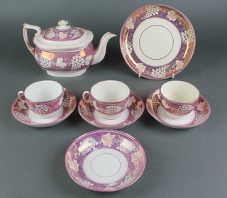 A 19th Century lustre tea set comprising teapot, 3 cups, 4 saucers and a shallow bowl all with purple vinous decoration  