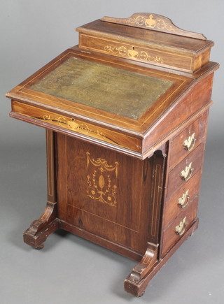 A Victorian inlaid rosewood Davenport the back fitted a stationery box, the slope with green leather writing surface, the pedestal fitted 4 long drawers 34"h x 21"w x 22"d 