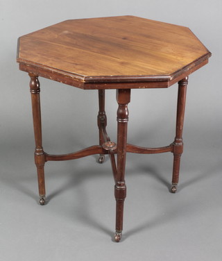 An Edwardian octagonal occasional table raised on turned supports with X framed stretcher 29 1/2"h x 29 1/2"w x 29"d 