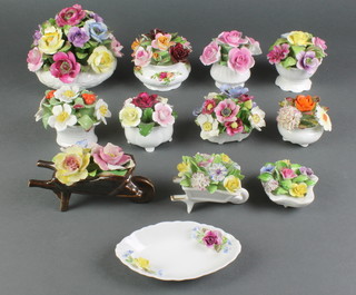 An Aynsley floral ornament and 11 others 