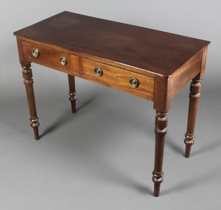A Victorian mahogany side table fitted 2 long drawers with replacement ring drop handles, raised on turned supports 29 1/2"h x 38 1/2"w x 18"d 