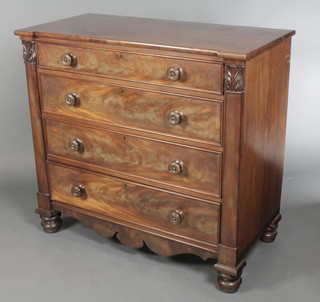 A Victorian mahogany chest of 4 long graduated drawers with columns to the side, raised on bun feet 41"h x 44"w x 21 1/2"d 