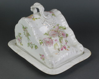 An Edwardian floral decorated cheese dish and cover 