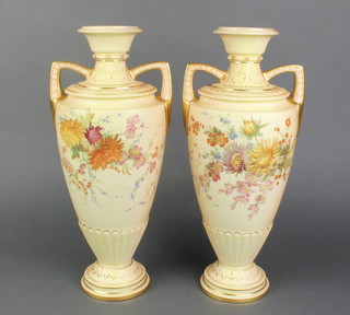 A pair of Victorian Royal Worcester twin handled vases, the blush ivory ground with floral decoration, raised on circular spreading feet, the base with purple Worcester mark and 6 dots, RD no. 23888321760  15"h 