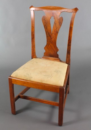 A Georgian walnut slat back dining chair with upholstered drop in seat, raised on square tapering supports with box framed stretcher 